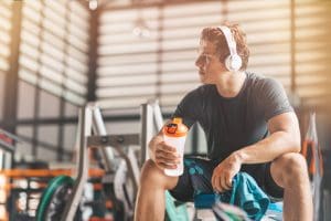 Man holding pre workout drink